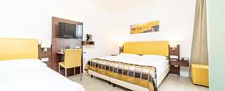 Dreibettzimmer